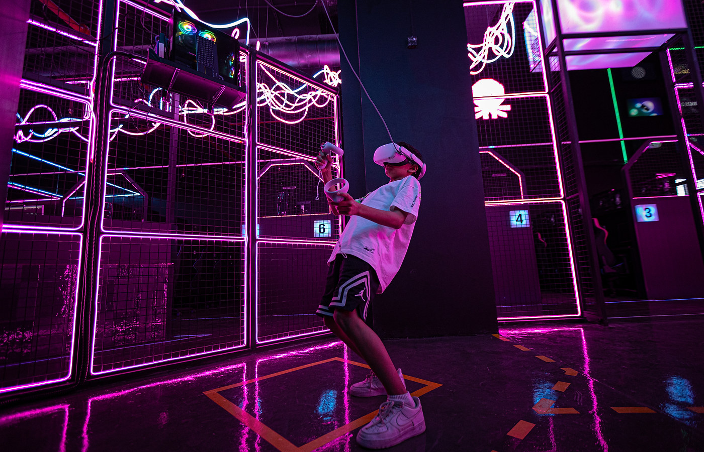 Player wearing a VR headset in the ZNTRX VR experience